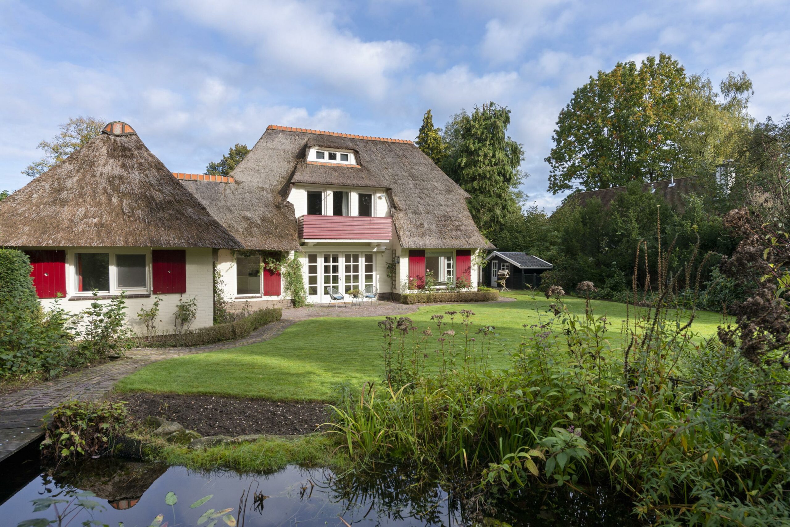 verbouw rietgedekte villa ontwerp modern foto